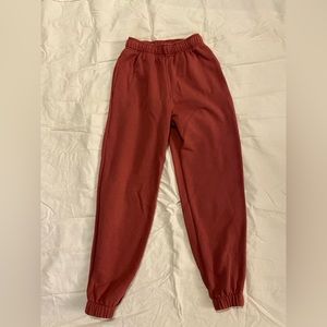 Wild Fable maroon sweatpants. They are mid-rise with full waistband elastic